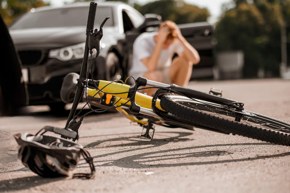 Damaged bicycle after a serious collision with a car